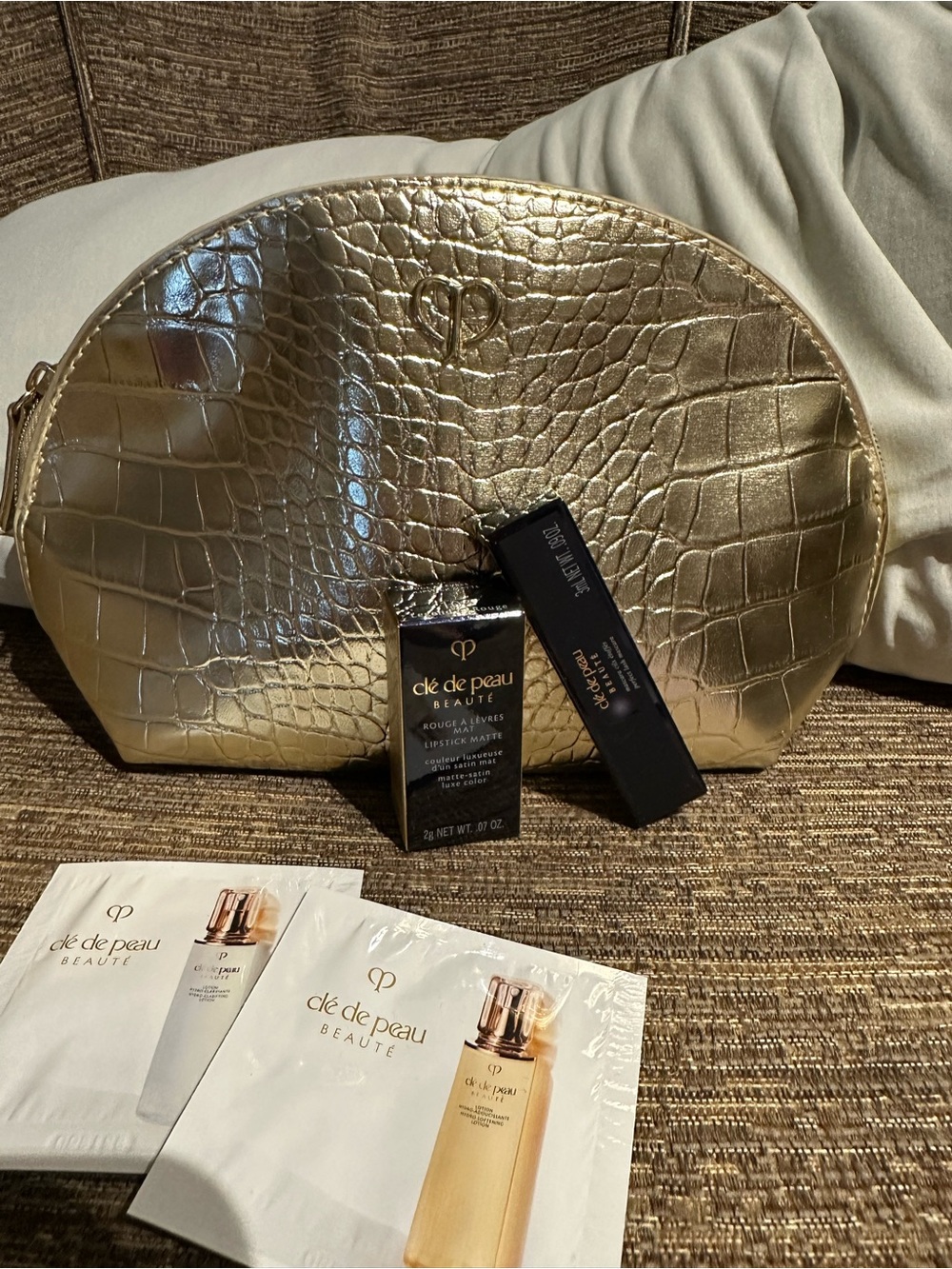 Cle de peau croc print Gold Cosmetic Bag with mini lipstick and mascara